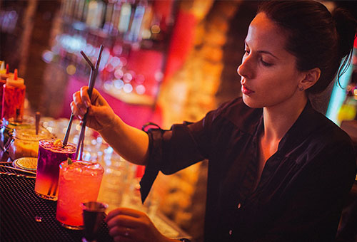 bartender mixing drinks